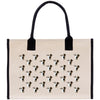 a beige tote bag with a repeating pattern of black and white dog faces on it.
