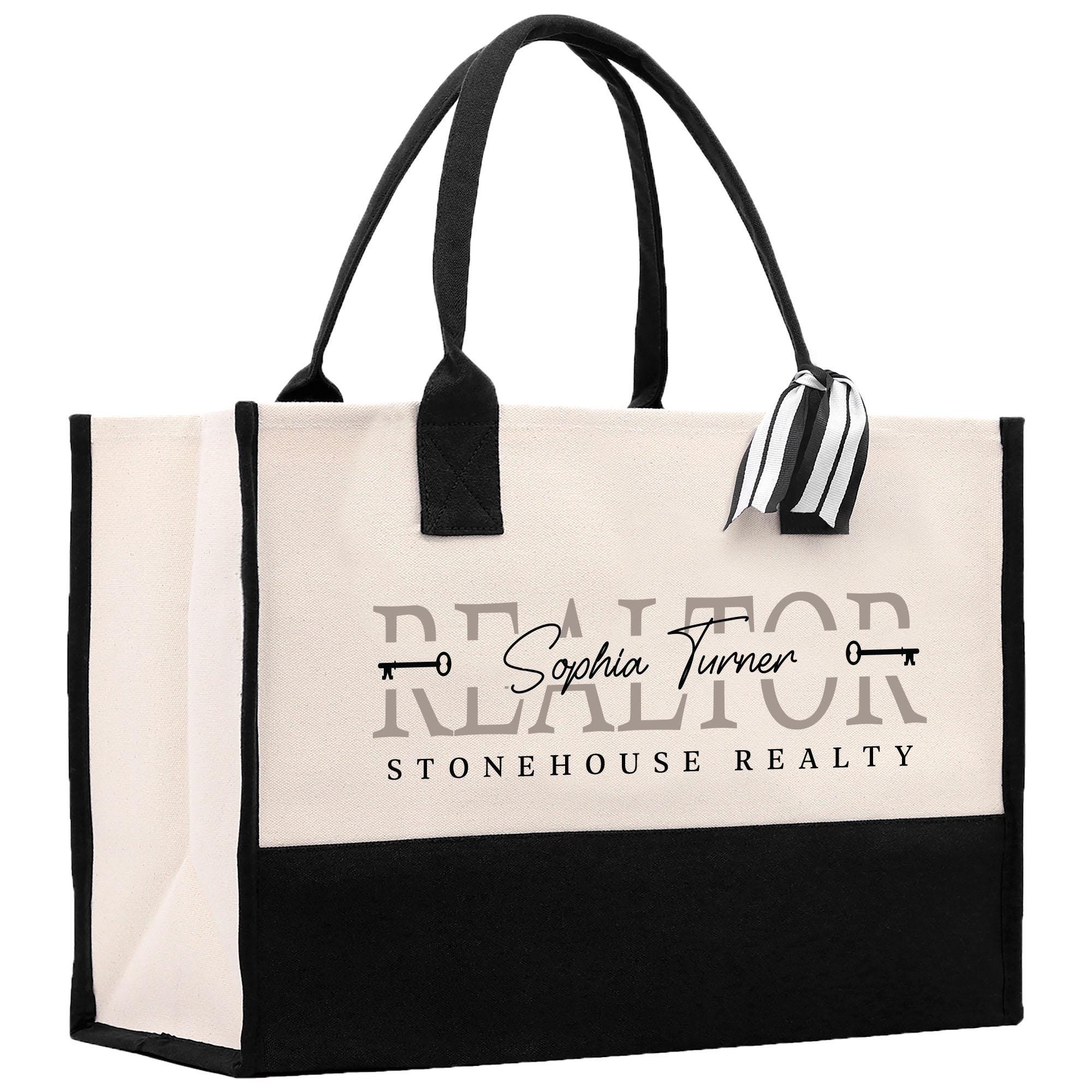 a black and white bag with a logo on it