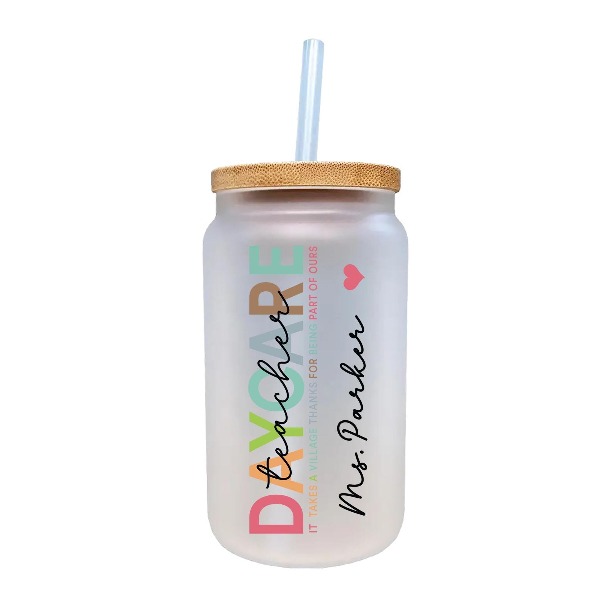 a glass with a straw inside of it