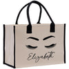 a bag with a face and eyelashes on it