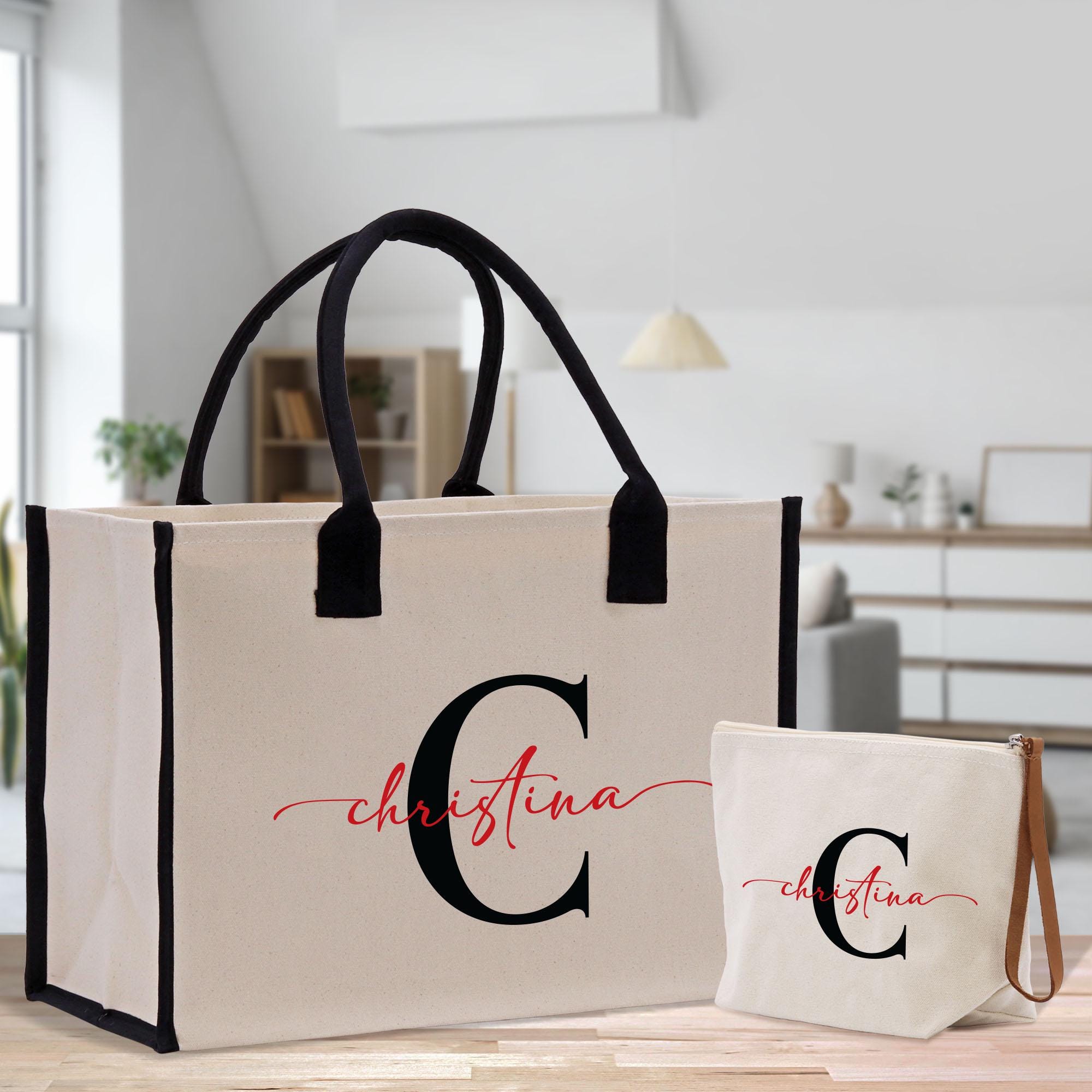 a bag and a tote bag sitting on a table