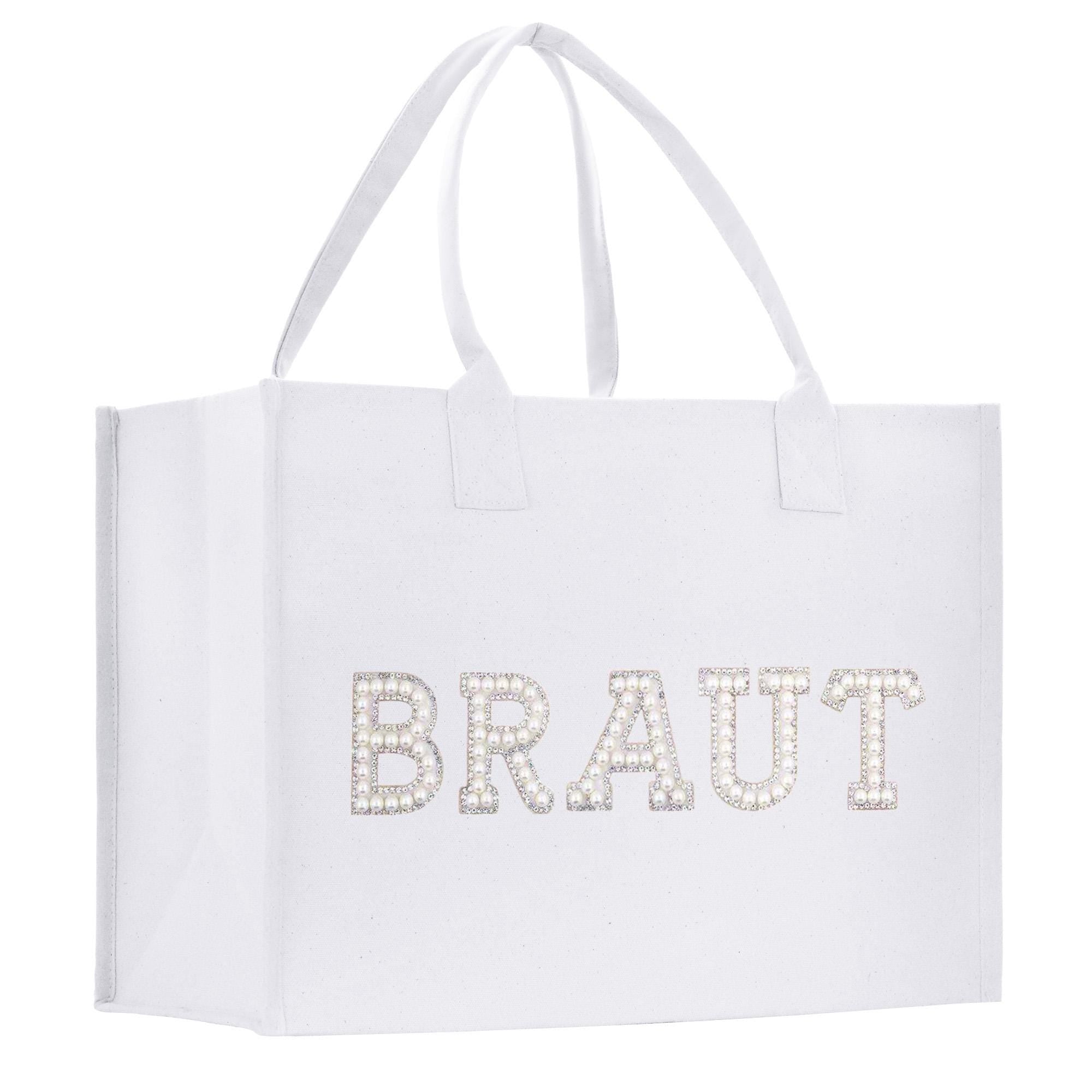 A white tote bag with the word &quot;BRAUT&quot; printed on it in large letters.