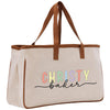a white bag with a brown leather handle