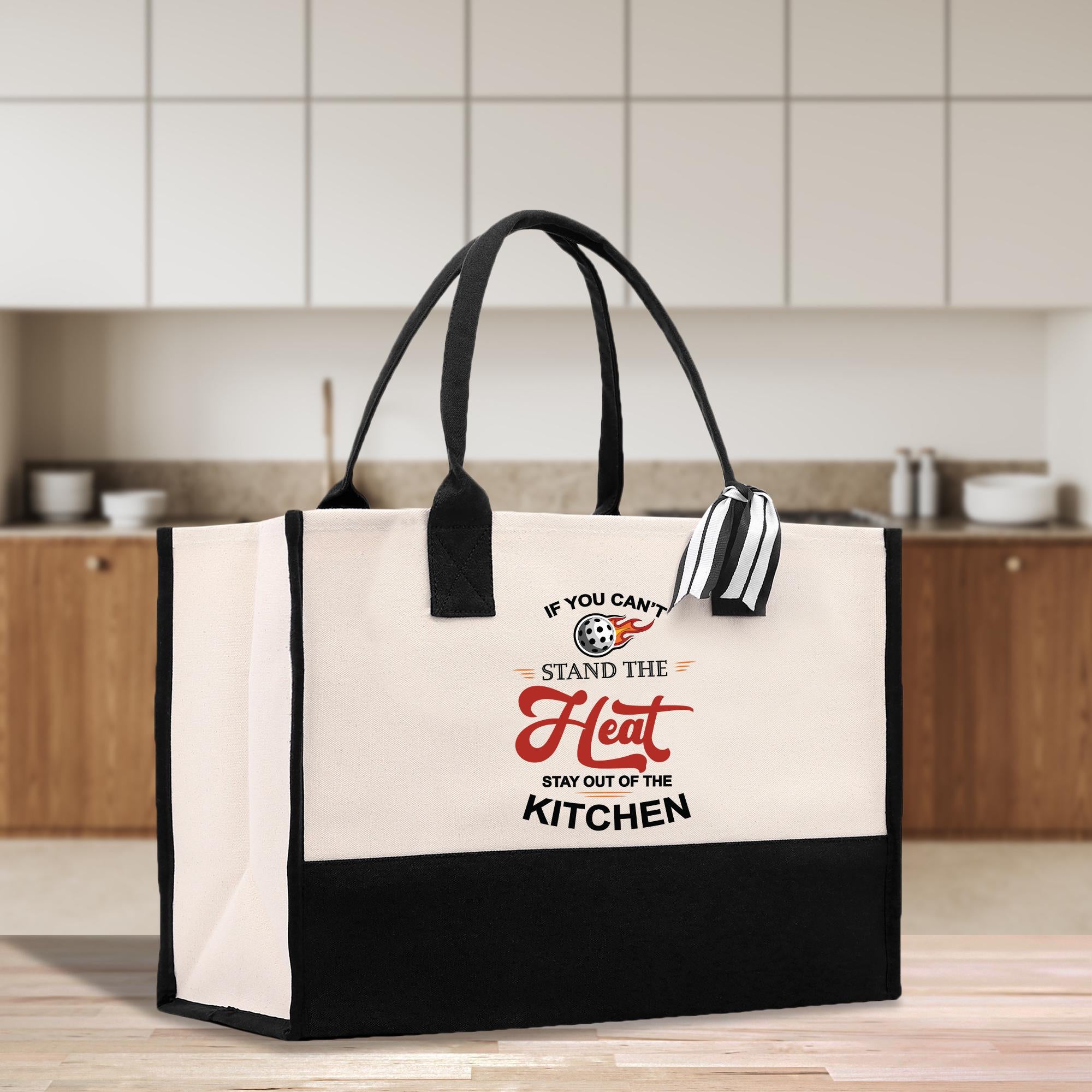 a black and white bag with a slogan on it