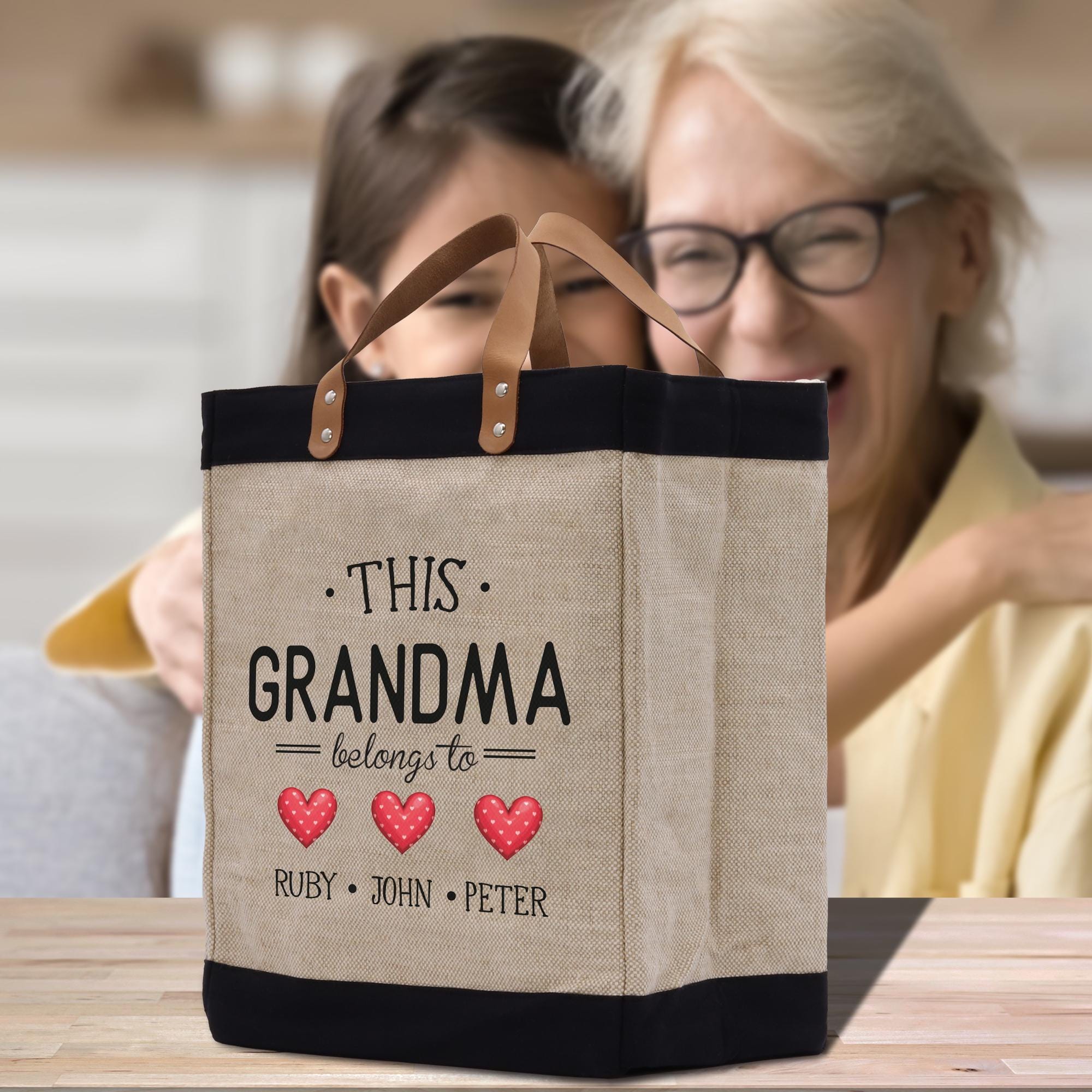 a woman and a child are looking at a bag
