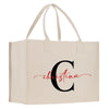 a white shopping bag with the letter c on it