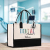 a black and white bag with a dental assistant on it