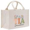 a canvas bag with the letter t a and flowers on it