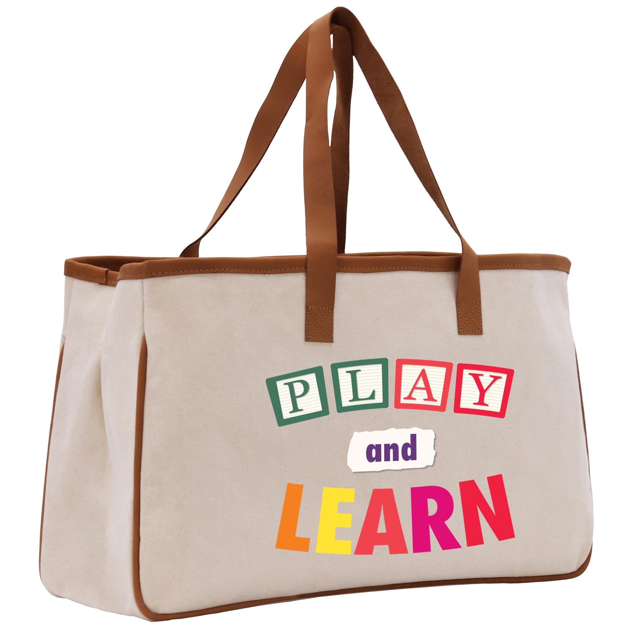 a canvas bag with the words play and learn printed on it