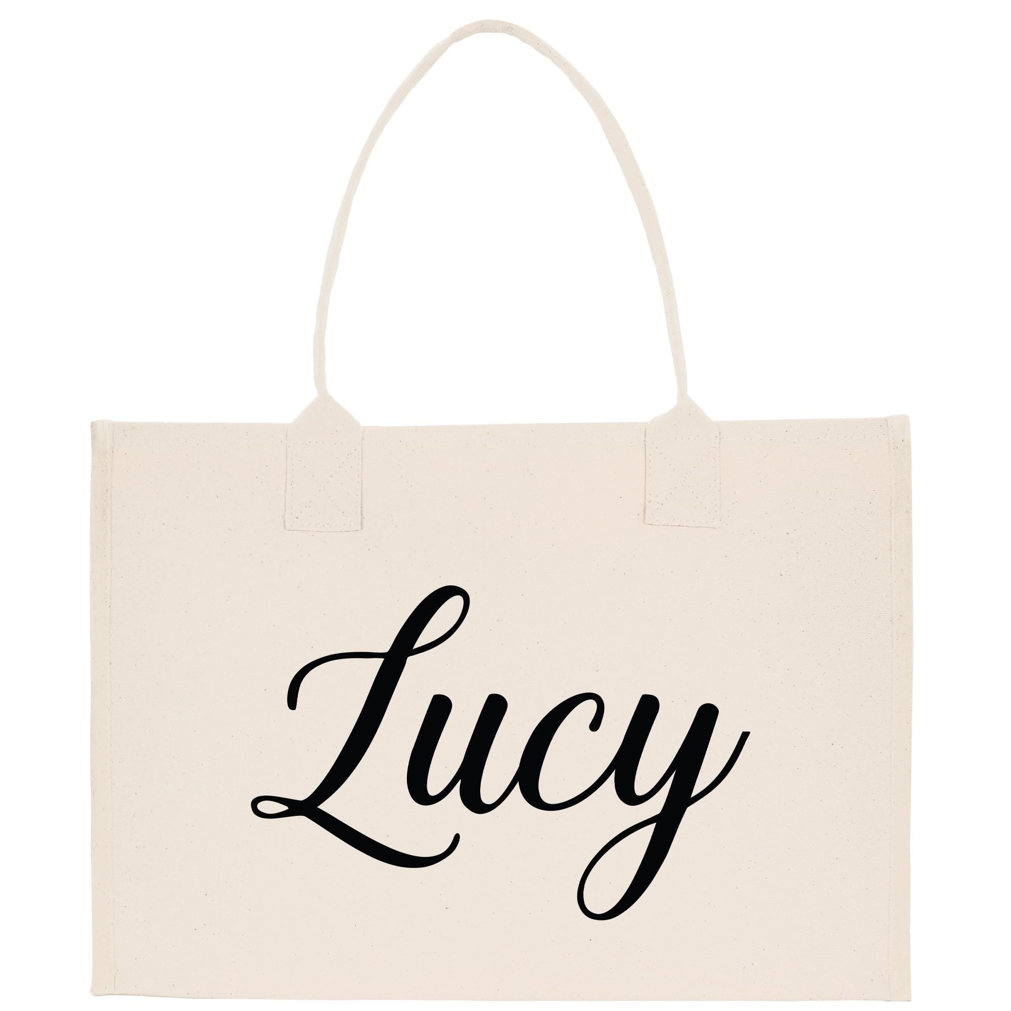 A beige canvas tote bag with the name &quot;Lucy&quot; printed in a cursive font.