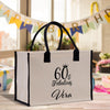 a white shopping bag with a black handle