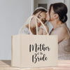 a mother of the bride tote bag with a bride kissing her daughter