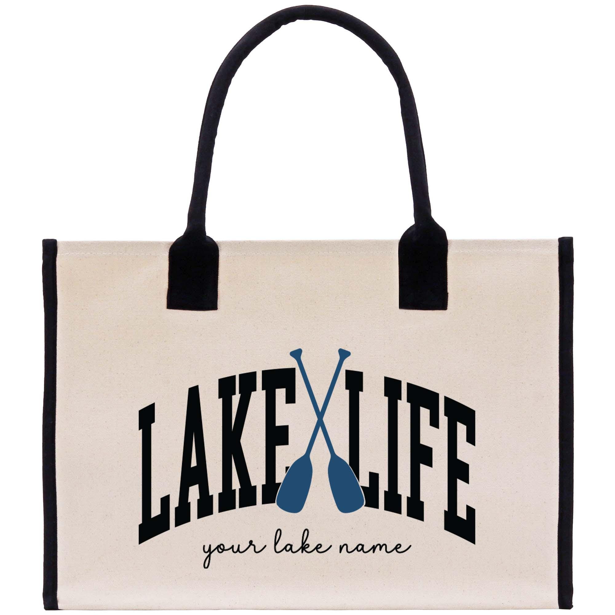 a lake life bag with two paddles on it
