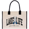 a lake life bag with two paddles on it