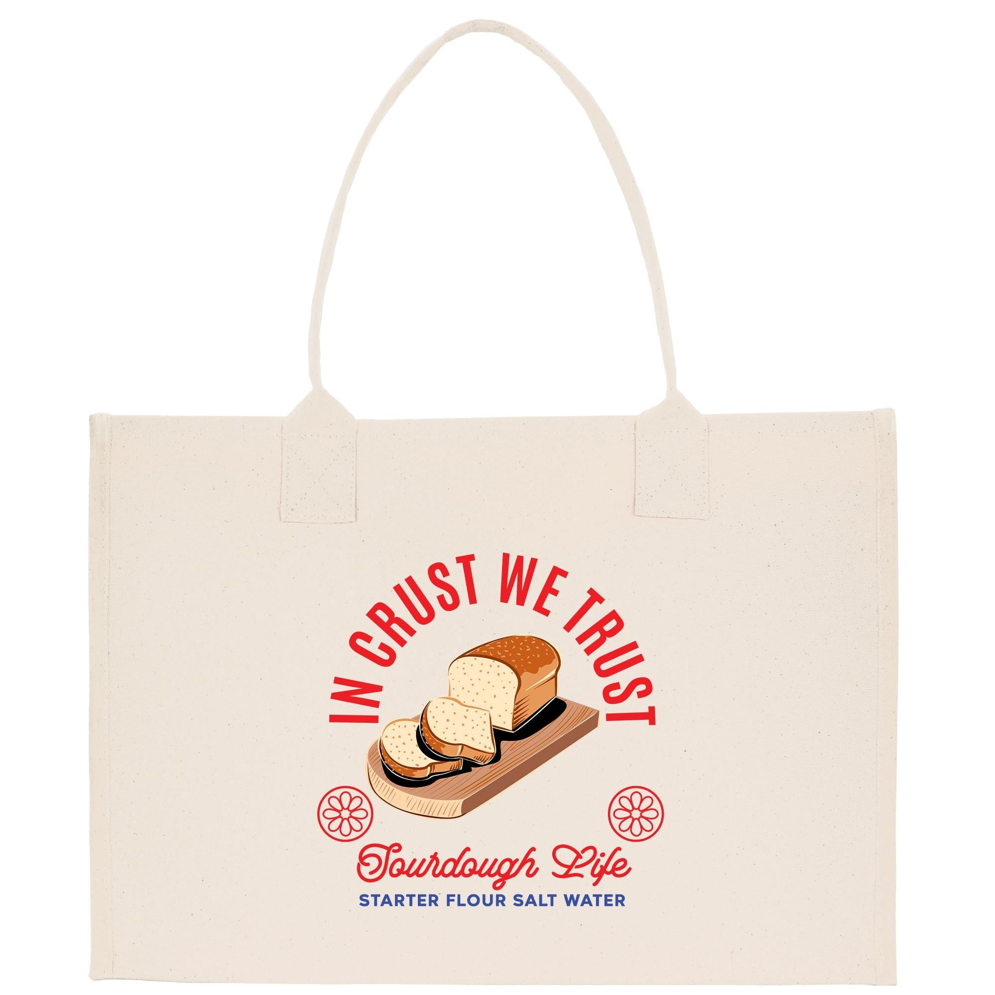 A beige tote bag with a graphic design featuring a loaf of bread and the text &quot;In Crust We Trust&quot; and &quot;Tourdough Life Starter Flour Salt Water&quot;.