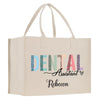 a white shopping bag with the words dental assistant in multicolored letters