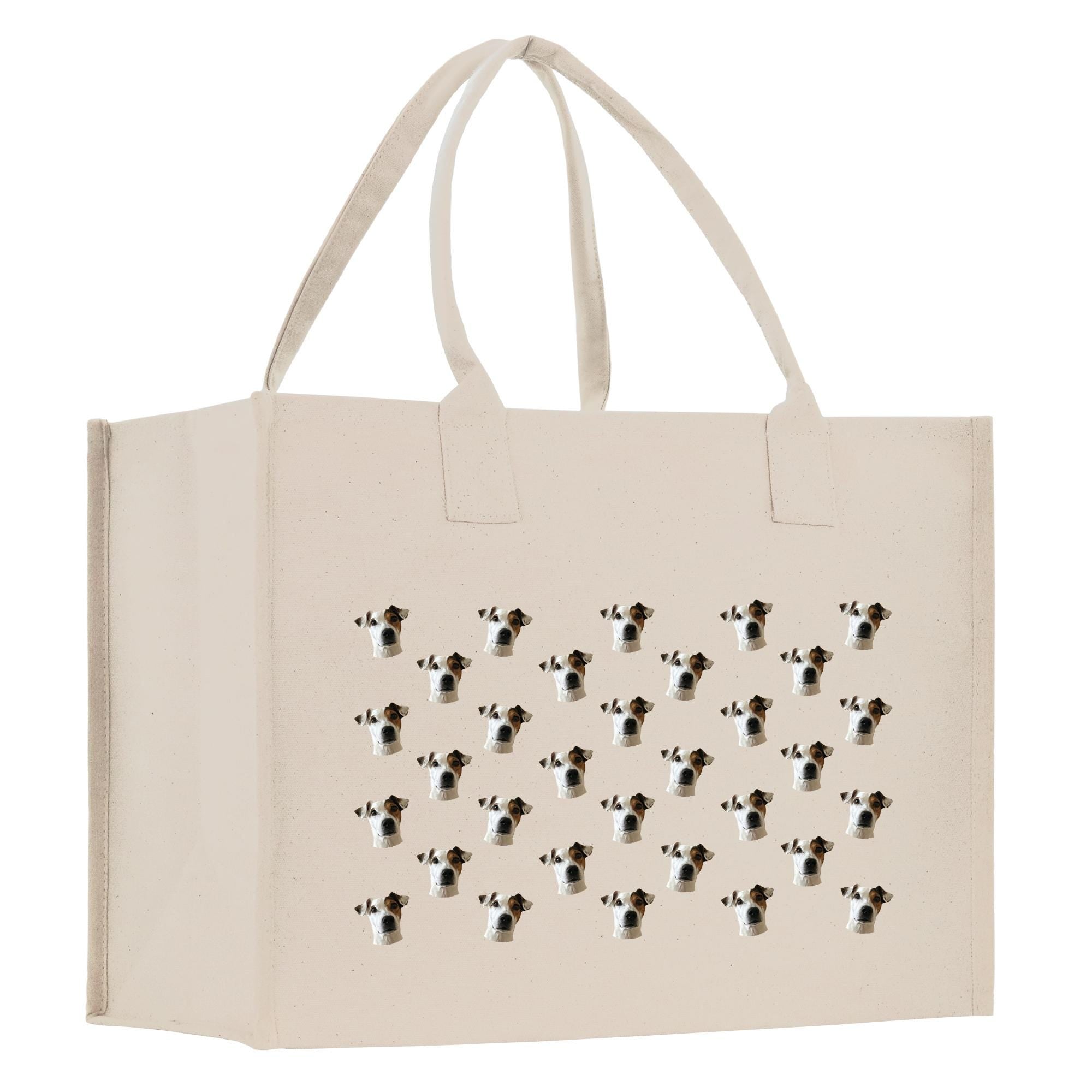 A beige canvas tote bag with a repeating pattern of dog faces printed on it.