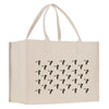 A beige canvas tote bag with a repeating pattern of dog faces printed on it.