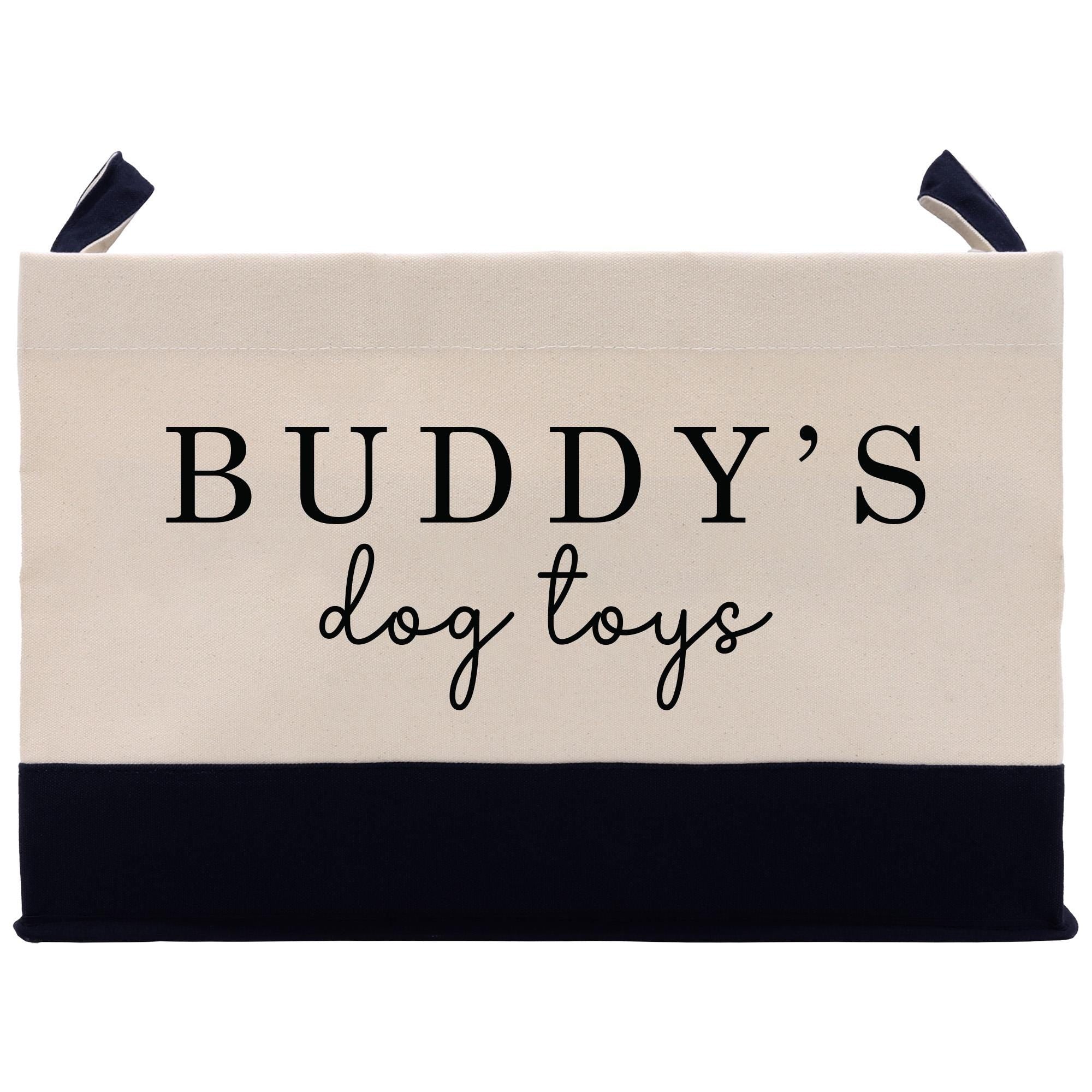 A beige and navy blue tote bag with the text &quot;BUDDY&#39;S dog toys&quot; printed on it.