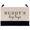 A beige and navy blue tote bag with the text "BUDDY'S dog toys" printed on it.