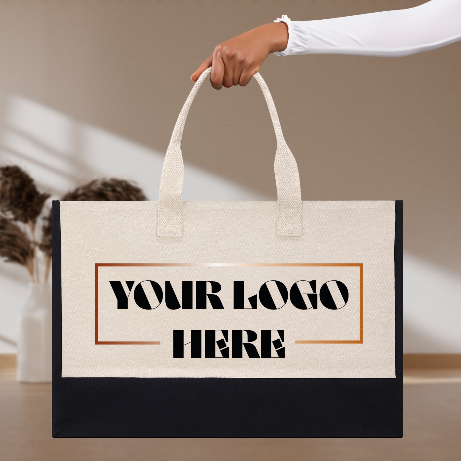 a person holding a bag that says your logo here