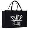 a black tote bag with scissors on it