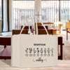A white tote bag with the text "GOD SAYS YOU ARE" printed on it, along with illustrations of various flowers.