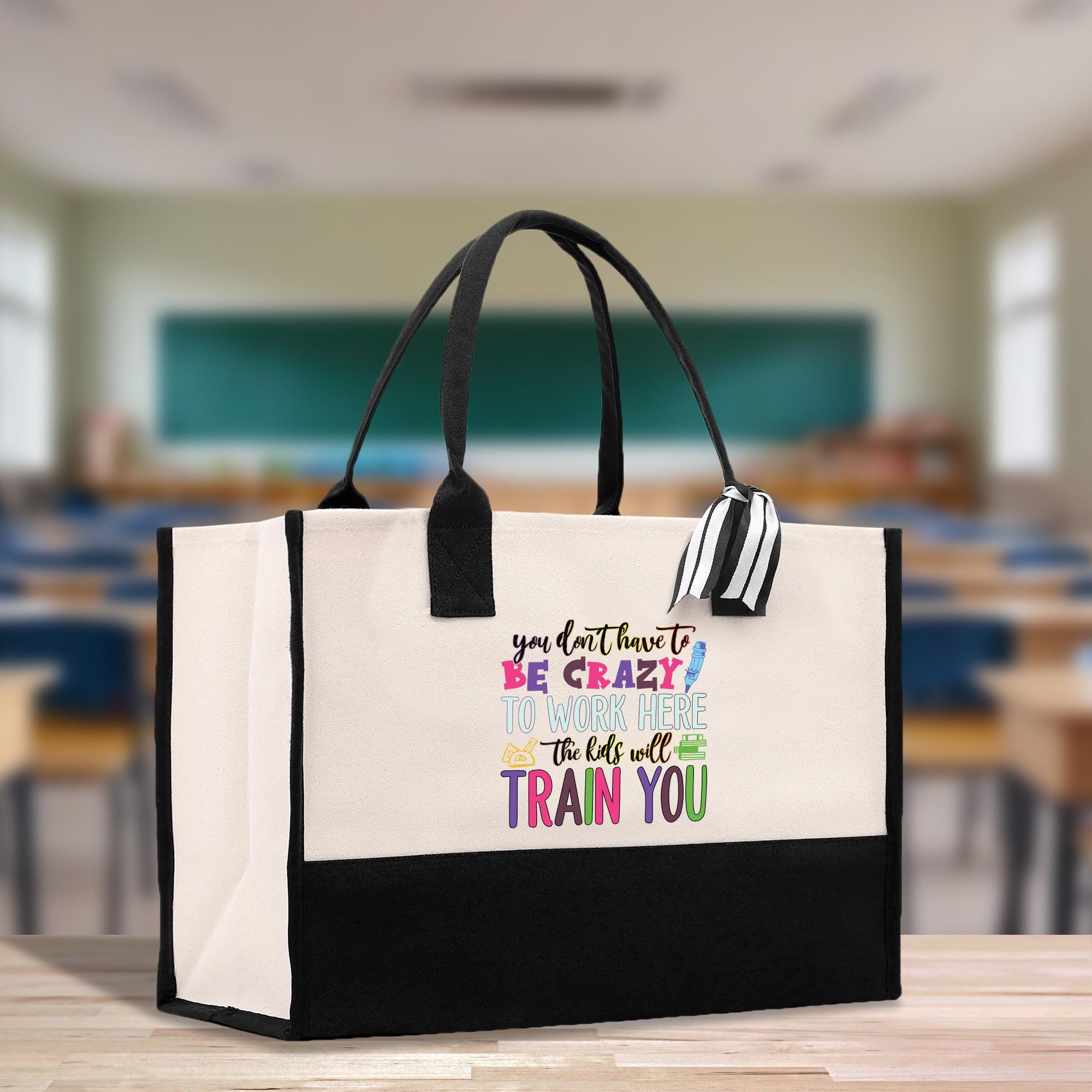 a black and white bag with a thank you message on it