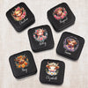 a set of four coasters with a picture of a cow