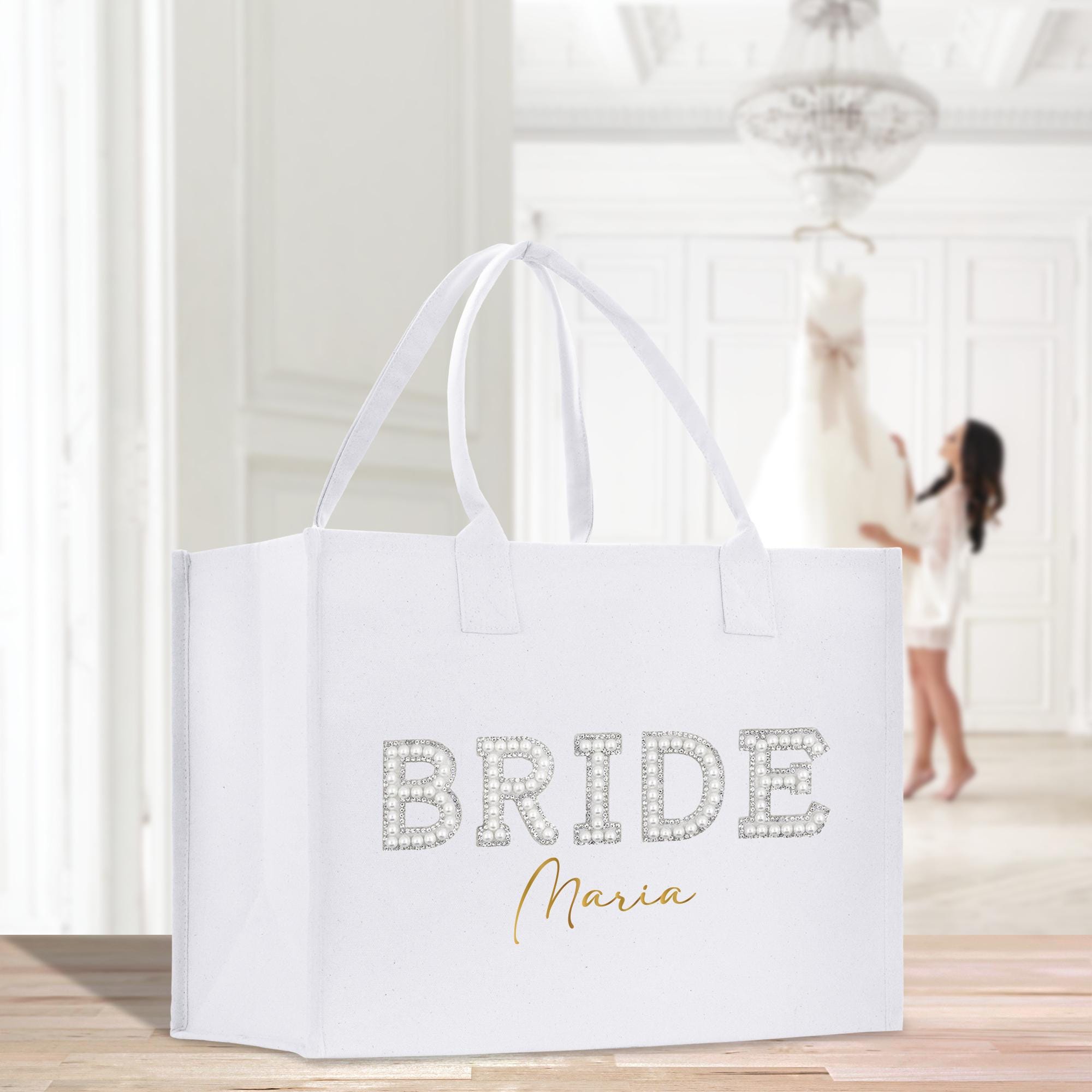 a white bag with the word bride on it
