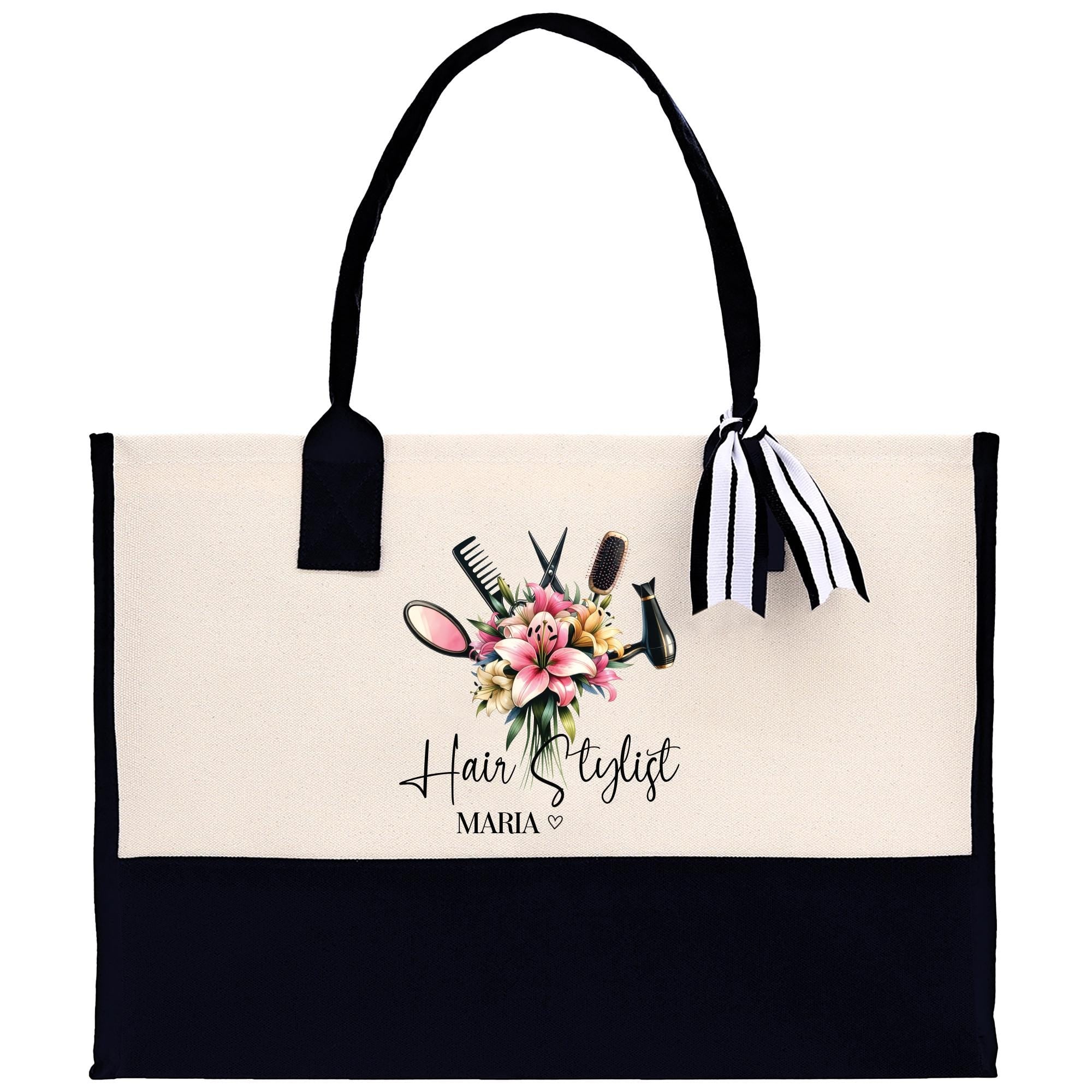 a black and white tote bag with flowers and scissors