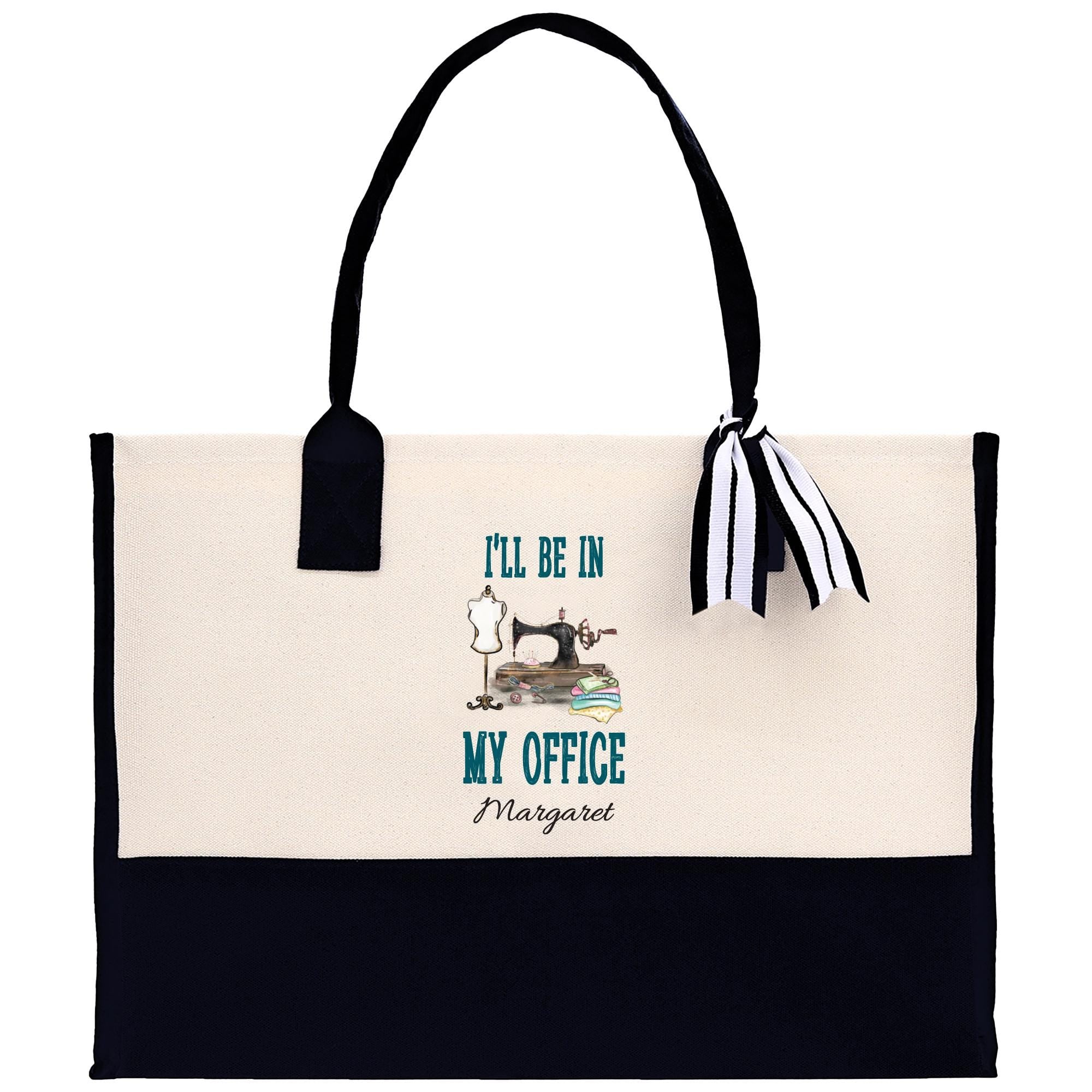 a black and white tote bag with a picture of a sewing machine