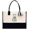 a black and white tote bag with a picture of a sewing machine