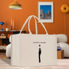 a white shopping bag with a picture of a woman on it