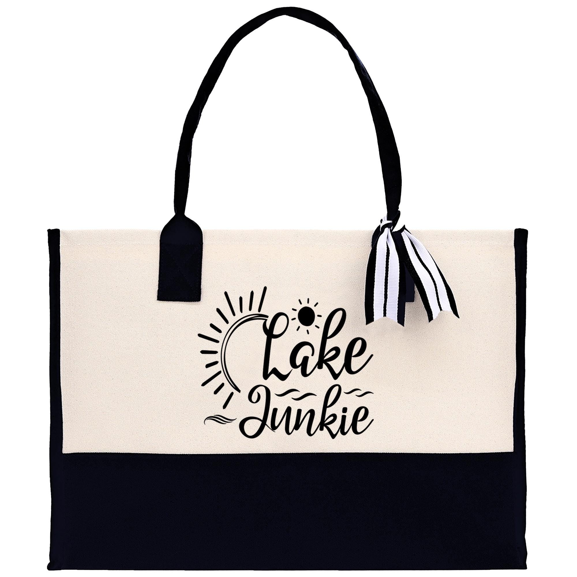A black and white tote bag with the text "Lake Junkie" printed on it.