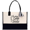 A black and white tote bag with the text 