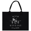 a black tote bag with the words hair stylist on it
