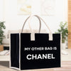 a black and white bag that says, my other bag is chanel