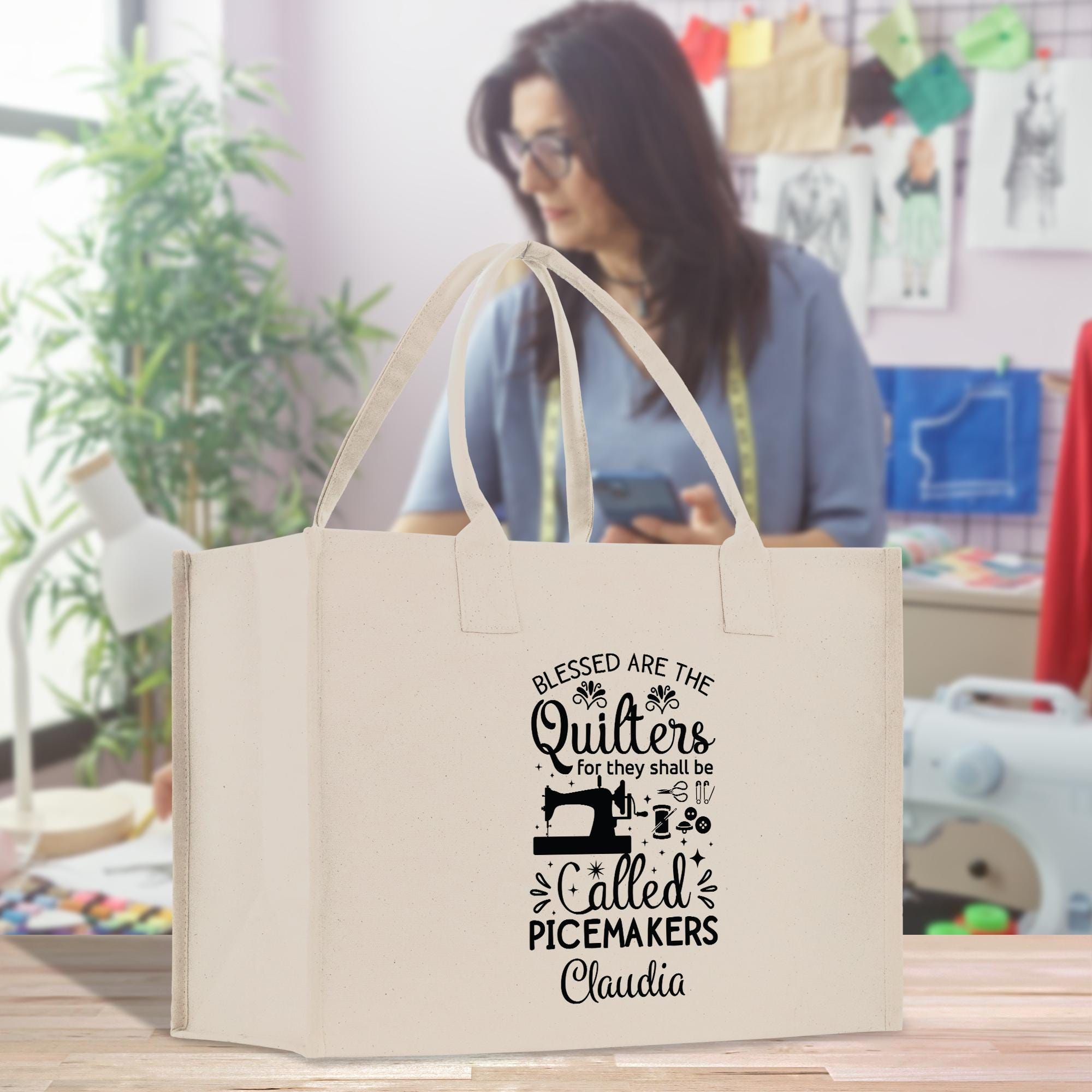 a woman looking at her cell phone while holding a shopping bag