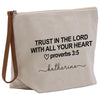 A beige canvas tote bag with black text and a heart symbol printed on it.