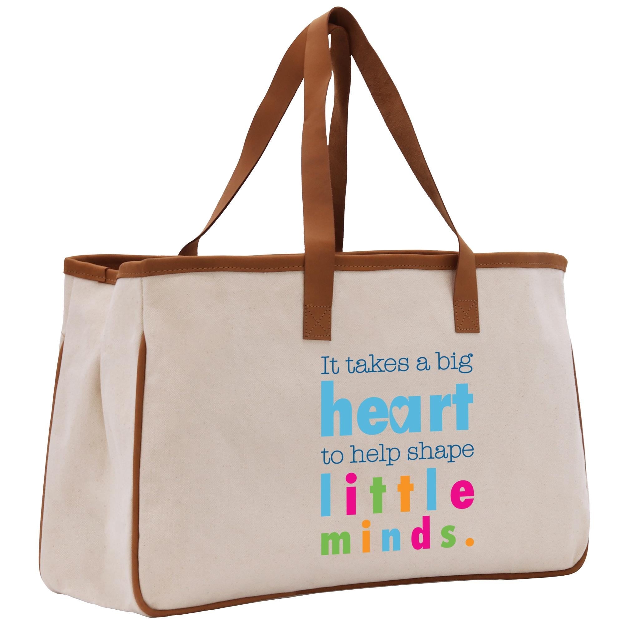 a canvas tote bag with a quote on it