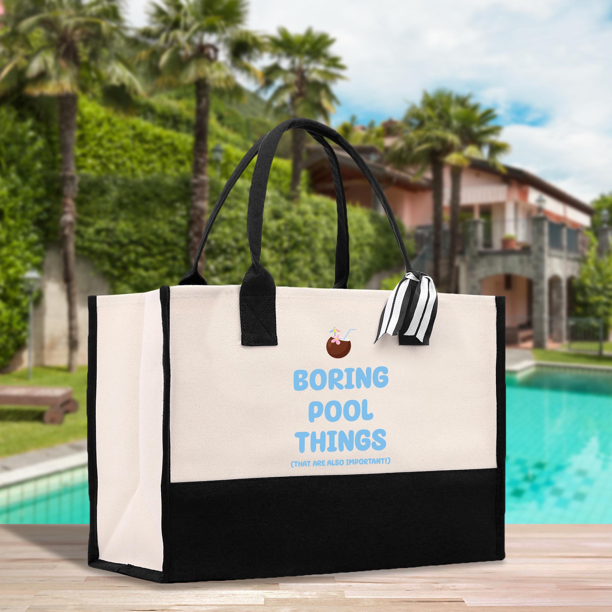 a white and black bag sitting on top of a wooden table
