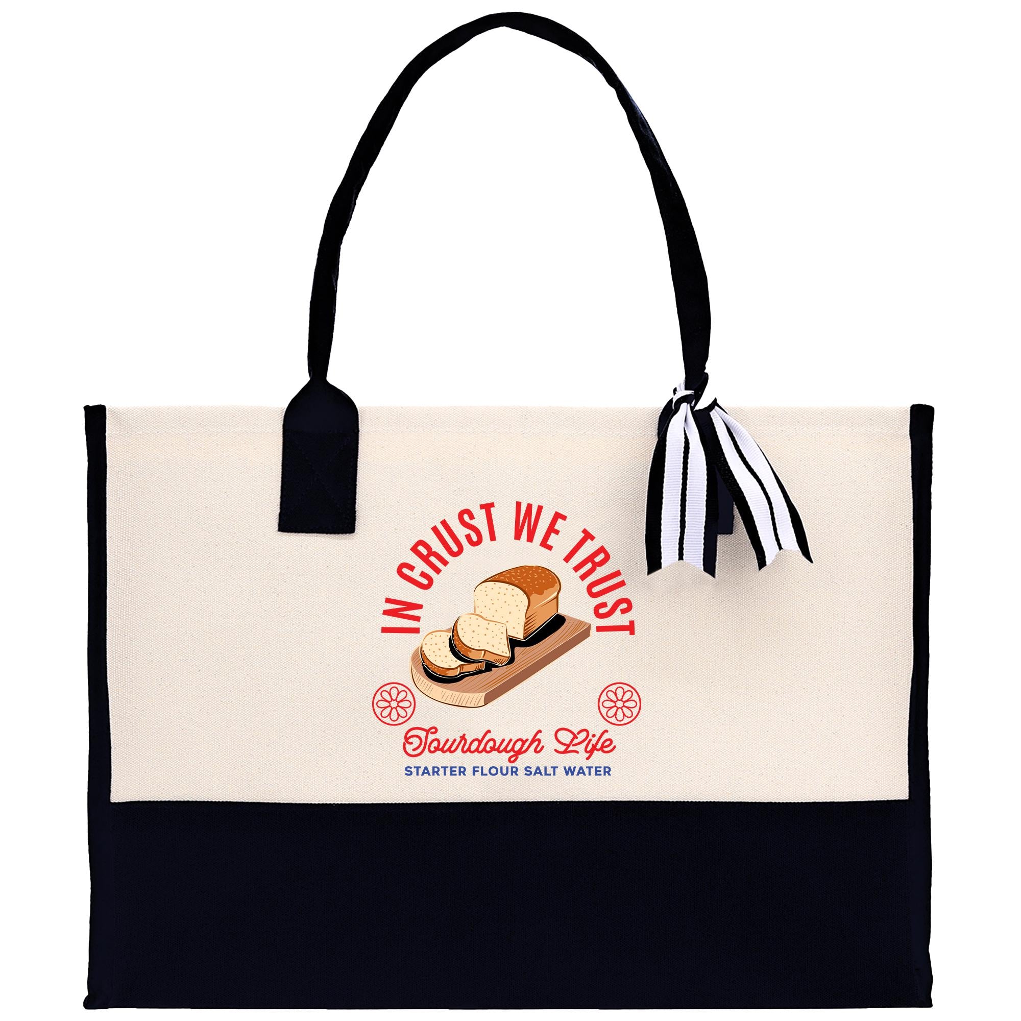 A tote bag with a printed design featuring a loaf of bread and the text &quot;InCRUST WE TRUST&quot; and &quot;Tourdough Life&quot; printed on it.