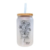 a glass jar with a straw in it