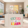 a play and learn bag sitting on a table
