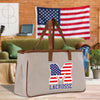 a large canvas bag with the letter m on it