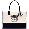 a white and black bag with a black handle