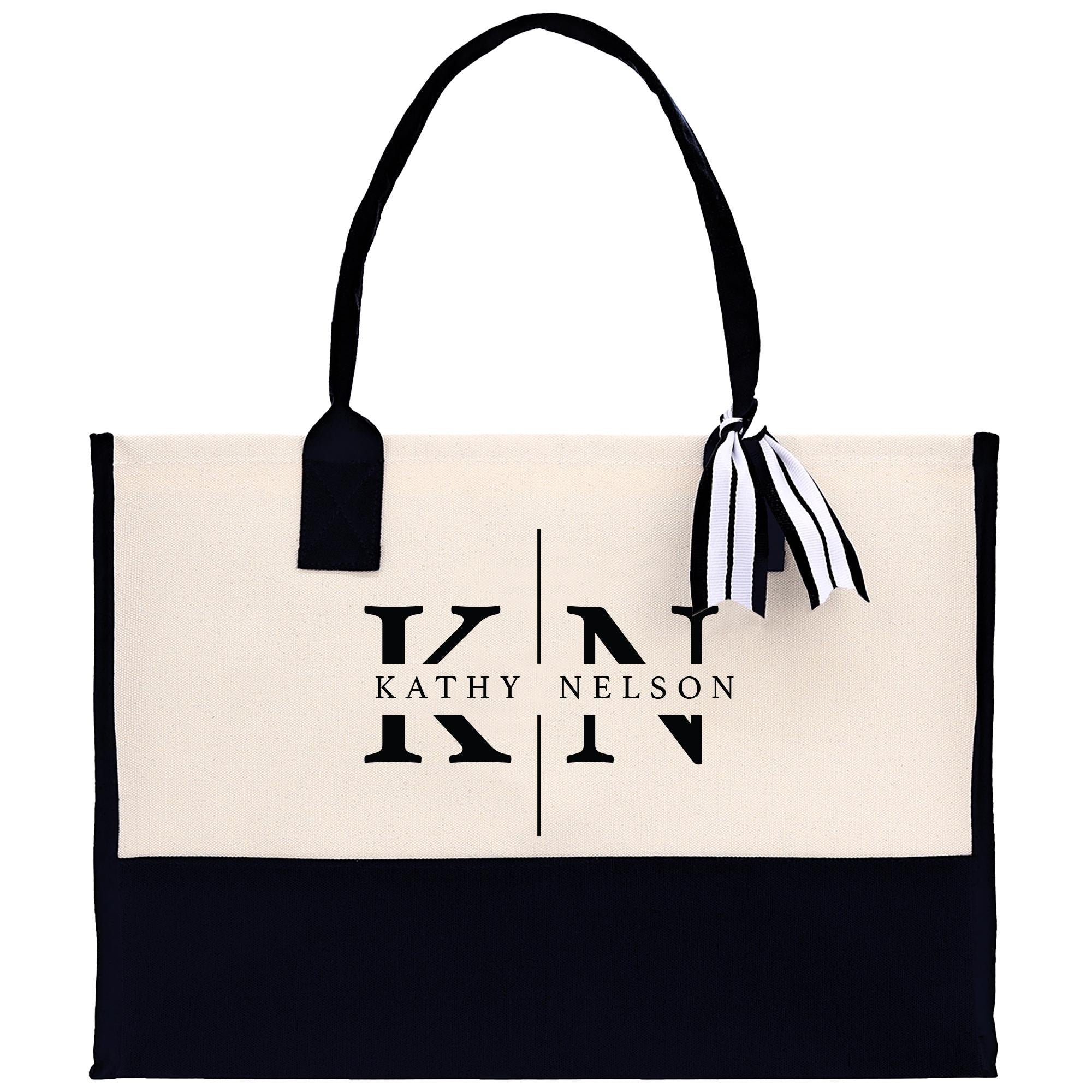 A black and white tote bag with the text &quot;Kathy Nelson&quot; printed on it.