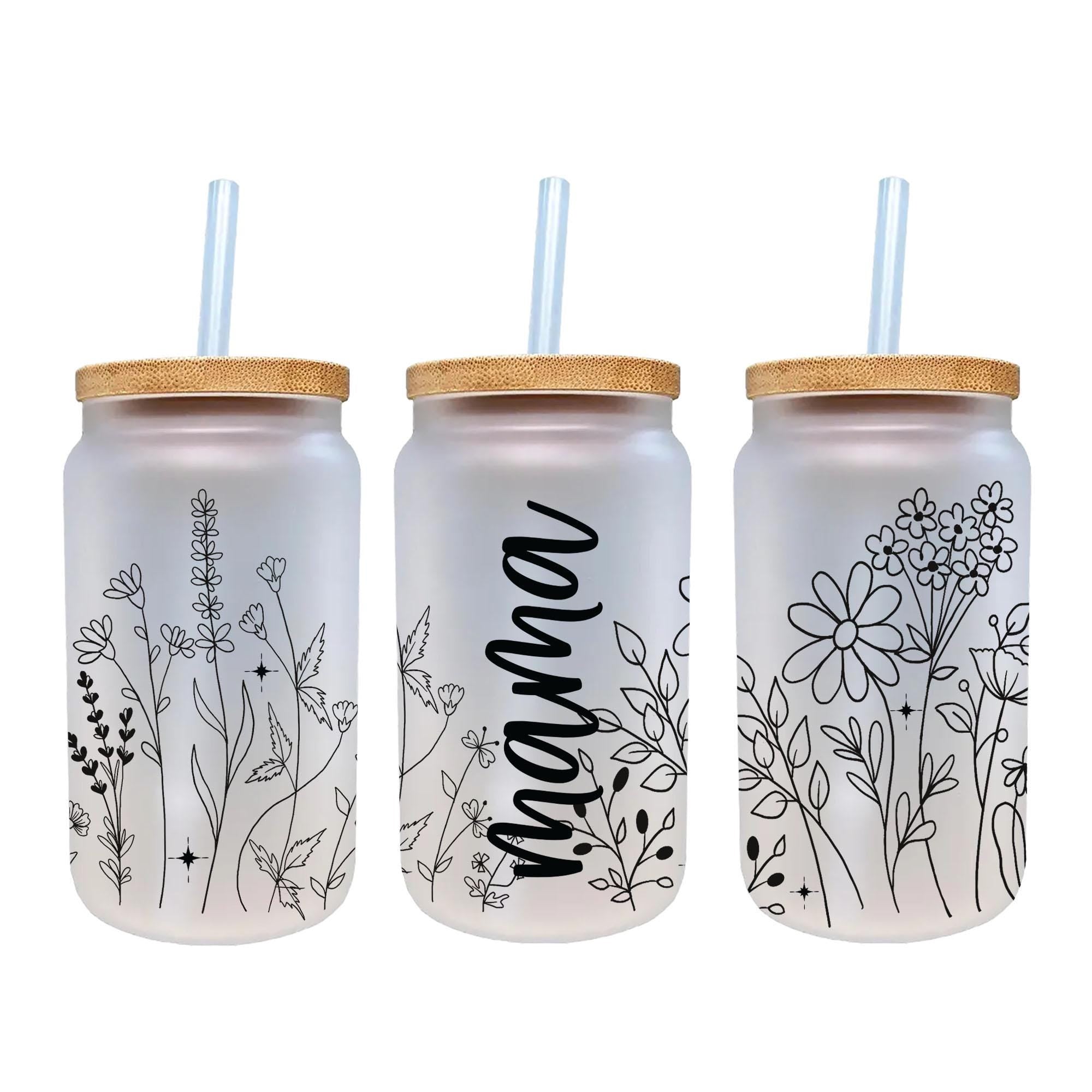 three mason jars with straw lids and straw lids