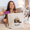 a woman sitting on a couch holding a bag